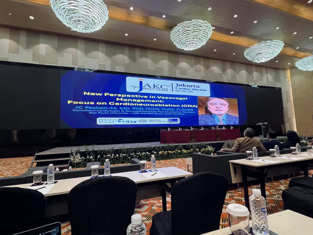 Main screen of the JAKC Rhythm (Jakarta Cardiac Rhythm) conference hall displaying the virtual lecture 'New Perspective in Vasovagal Management: Focus on Cardioneuroablation (CNA)' with the speaker's portrait and credentials.